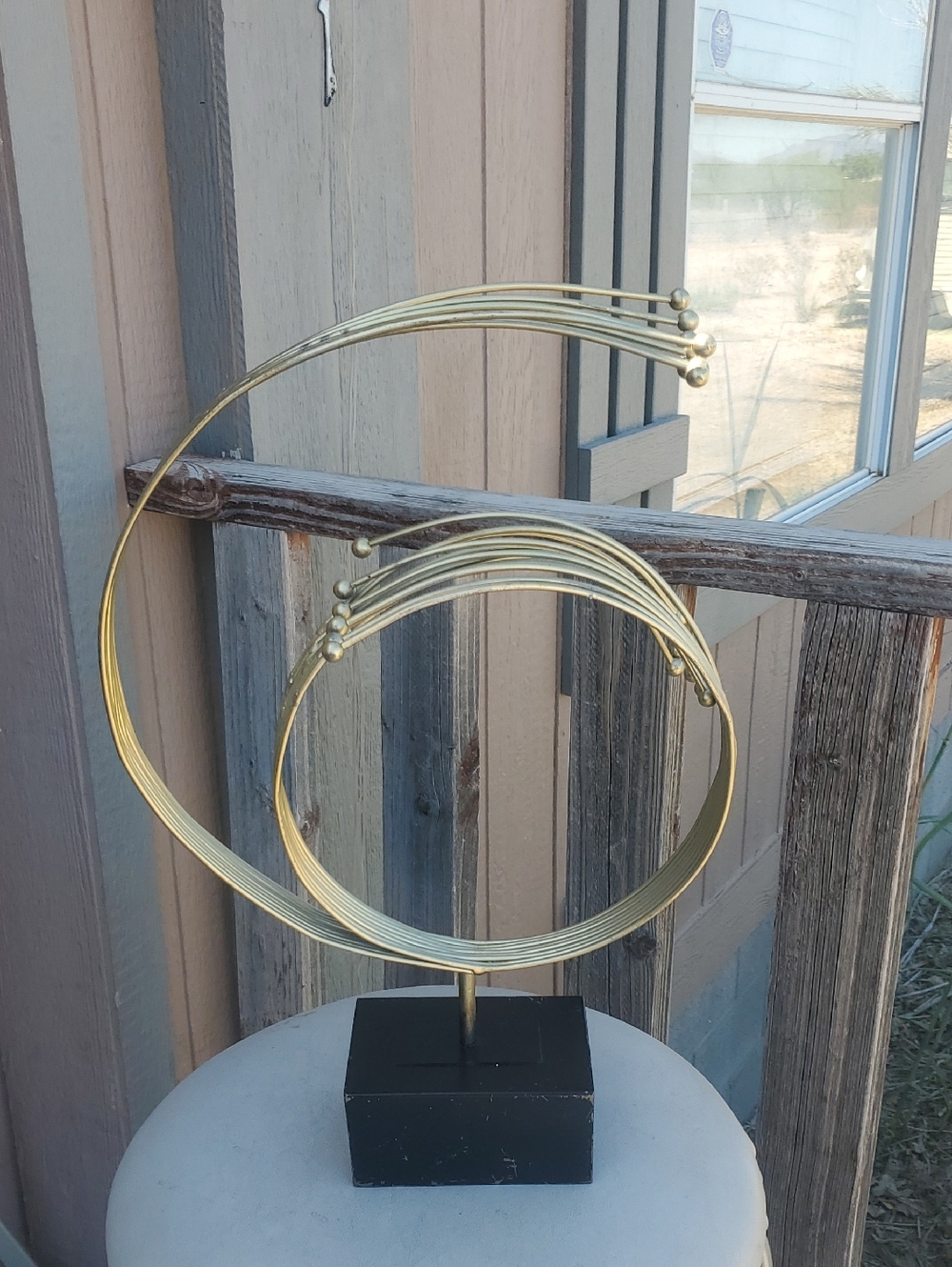 Modern Gold Metal Abstract Loop Sculpture on Black Base